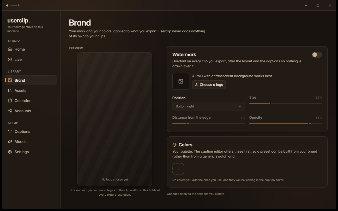 The userclip application, showing the brand kit screen with a watermark preview and colour palette.